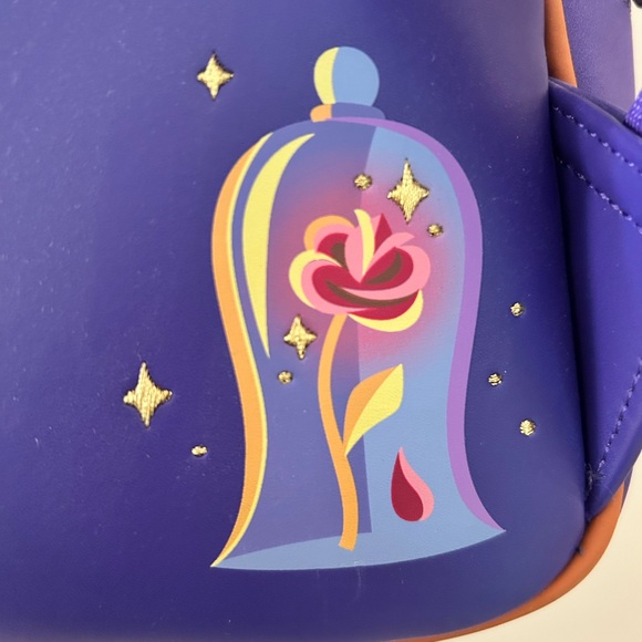 beauty and the beast 30th anniversary loungefly mini backpack Disney Belle Roses Potts sings their love song is probably the most iconic scene from the film Loungefly Disney Beauty And The